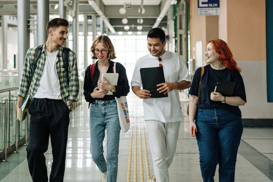 Health professionals walking down a hospital corridor